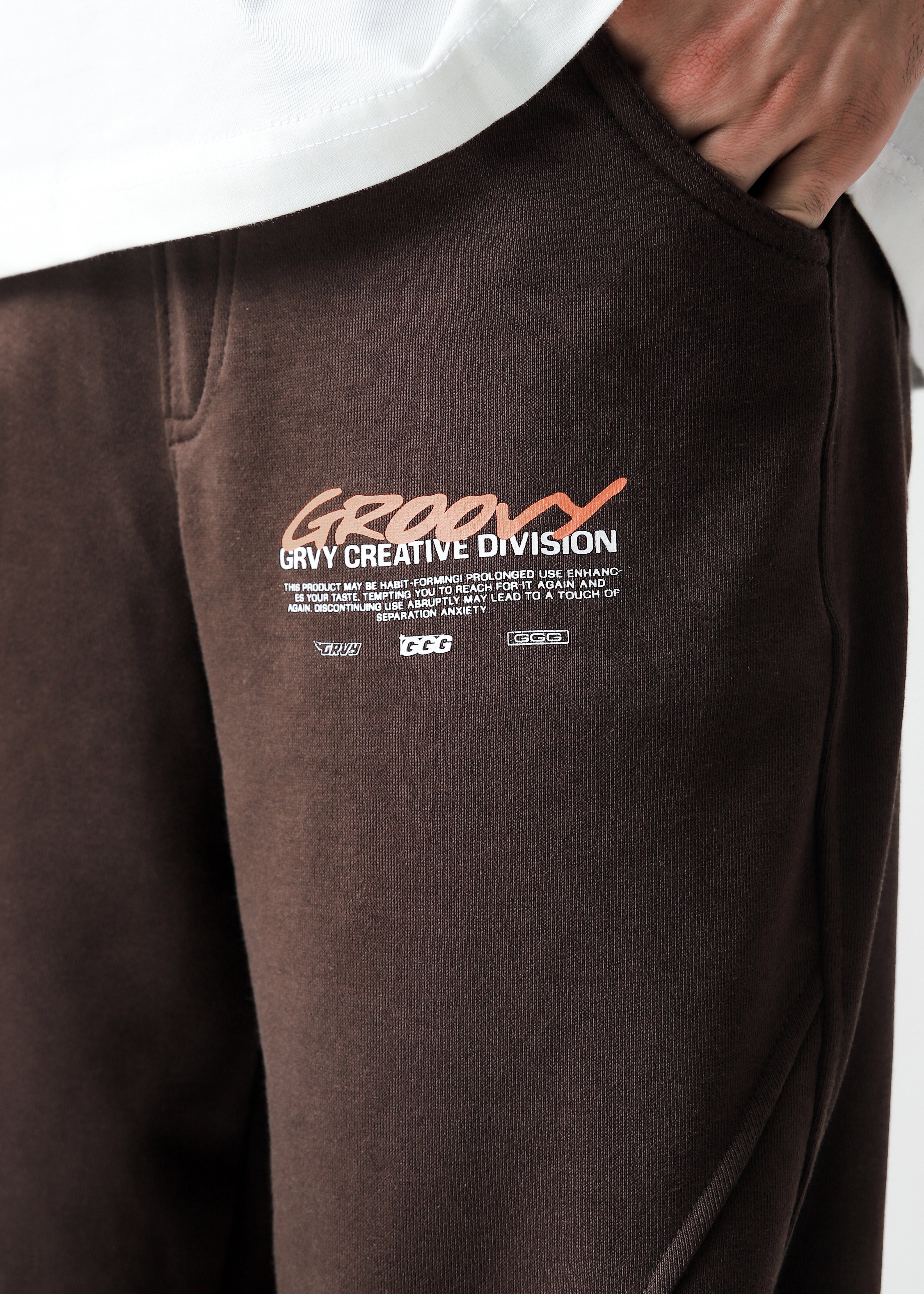 Mocha brown Unity VI pants male model half body lifestyle shot Pakistan – GROOVY