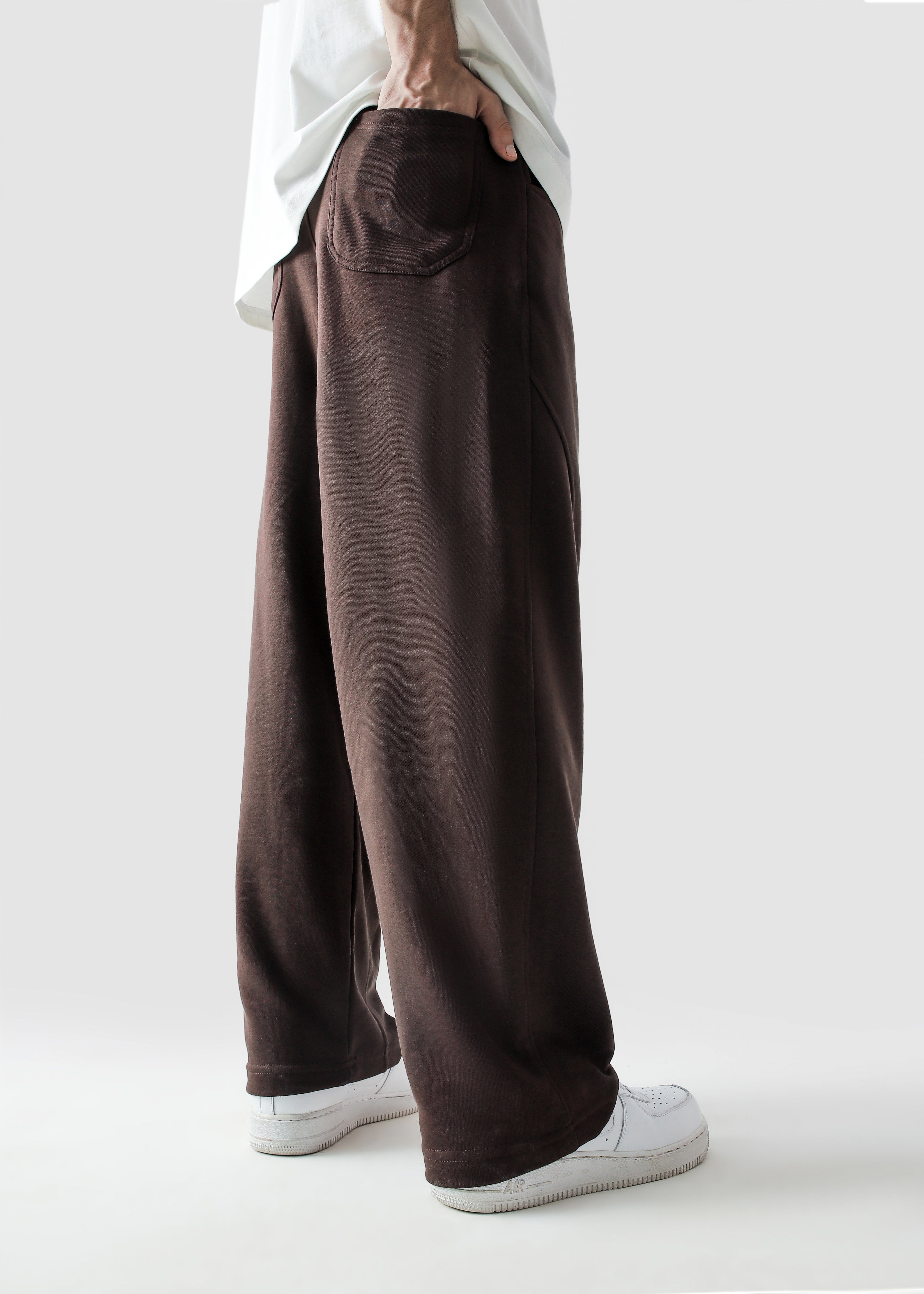 Mocha brown Unity VI pants male model side view full body Pakistan – GROOVY
