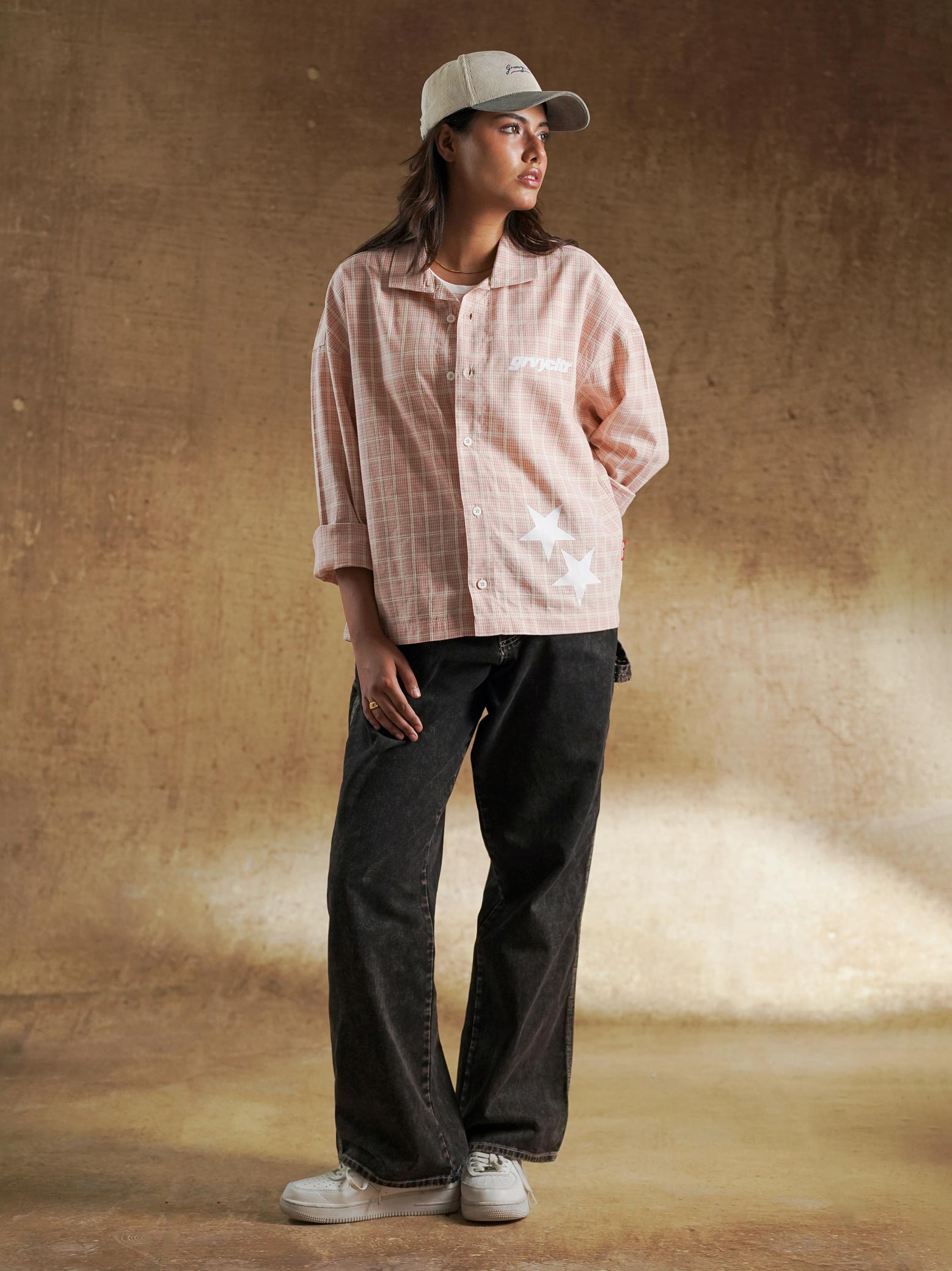 Plaid shirt worn open over a cream tee - GROOVY Pakistan