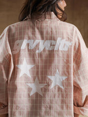 Shoulder seam and sleeve drape on plaid shirt - GROOVY Pakistan