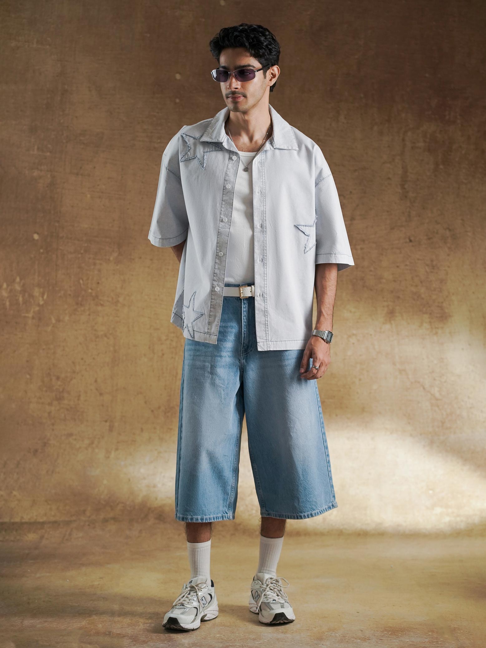 Star Denim Shirt styled with light wash jeans - GROOVY Pakistan