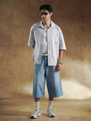 Star Denim Shirt styled with light wash jeans - GROOVY Pakistan