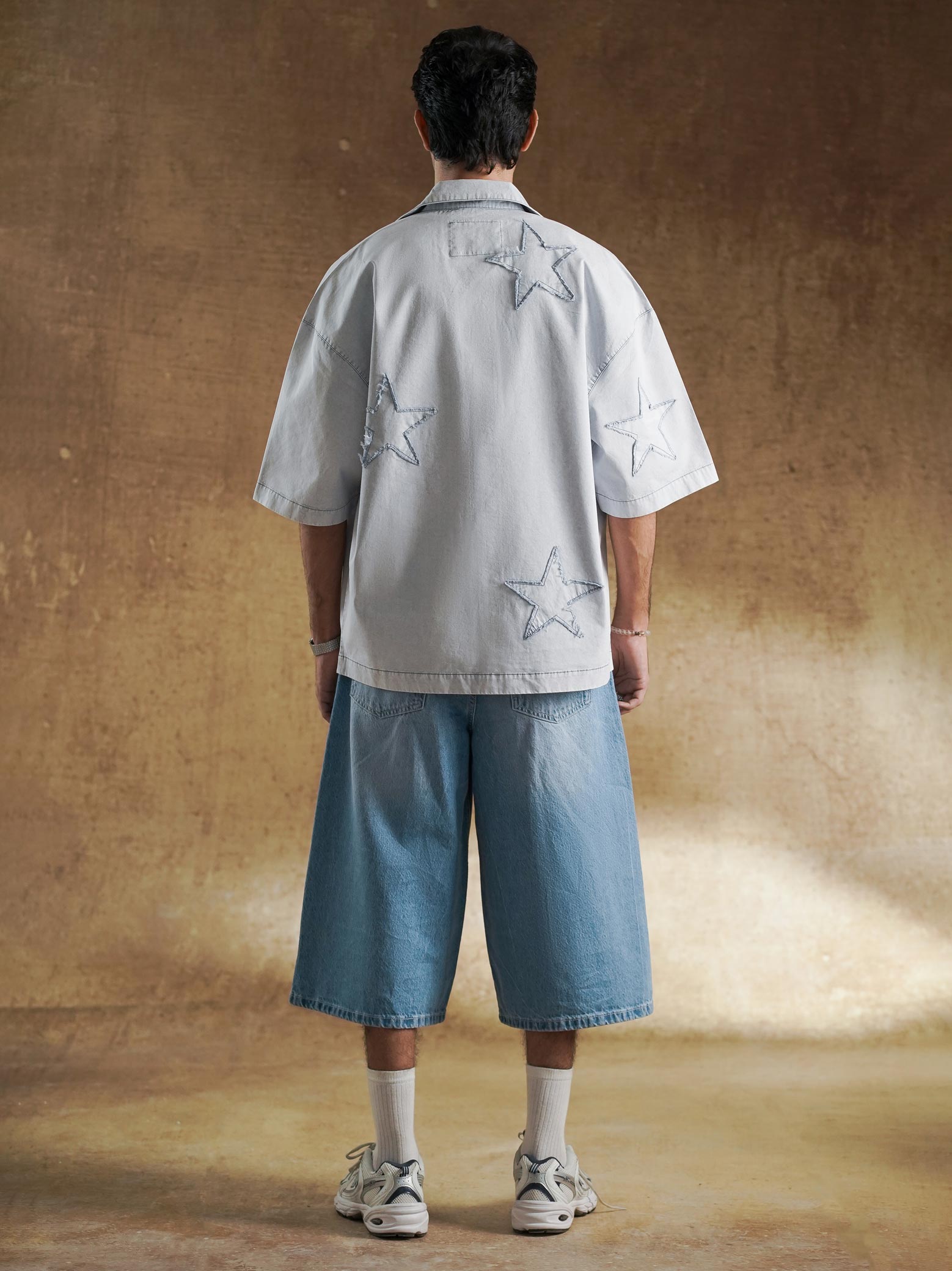 Collar and shoulder line on oversized denim shirt - GROOVY Pakistan