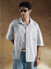 Female model wearing grey star appliqué shirt - GROOVY Pakistan