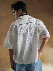 Twin tribal chest motifs on woven grid check - GROOVY Pakistan
