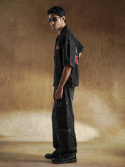 Acid wash shirt worn open over a white ribbed tee - GROOVY Pakistan
