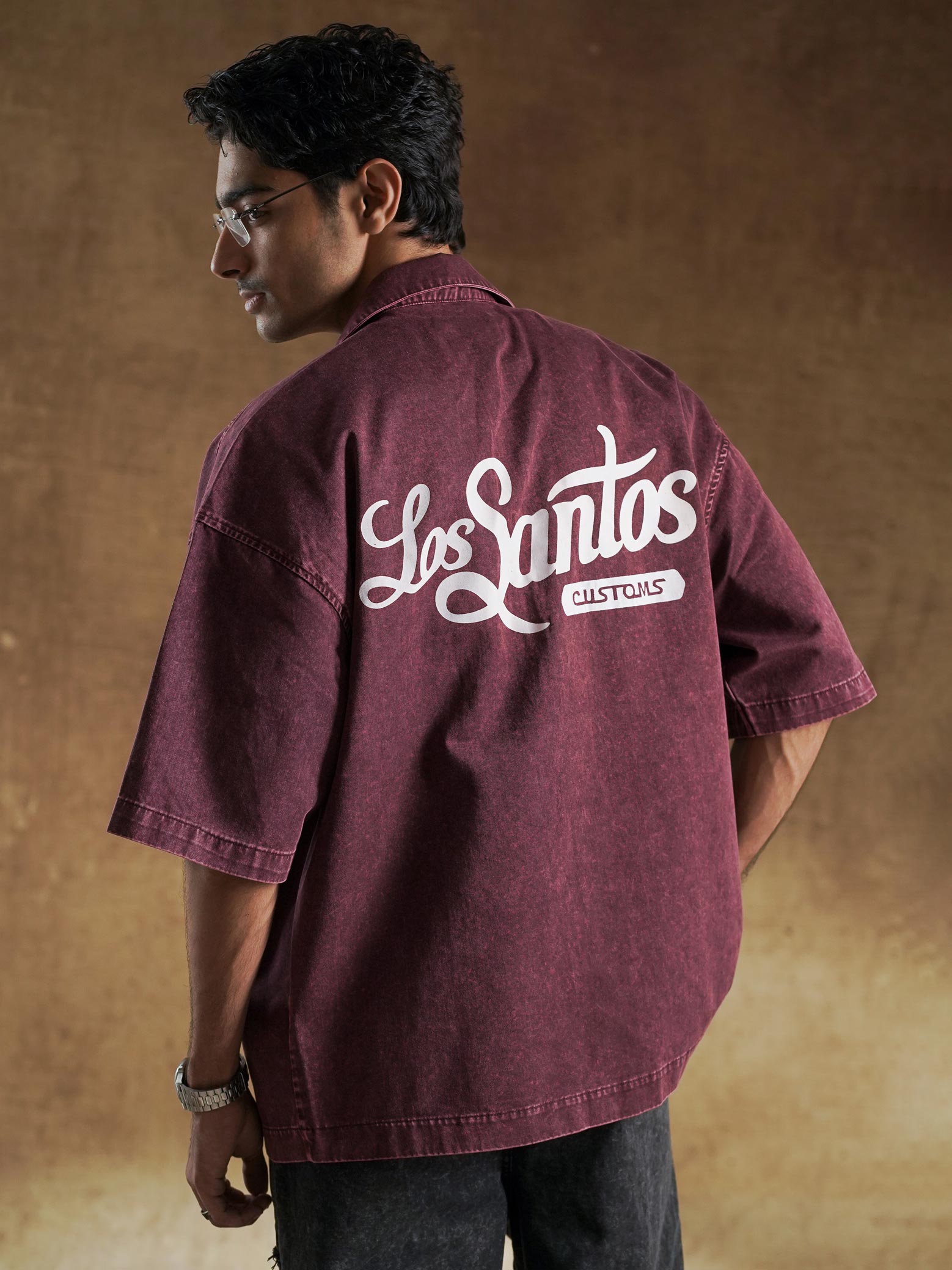 Chest logo detail on burgundy oversized shirt - GROOVY Pakistan