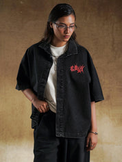Half sleeve cuff on oversized black denim shirt - GROOVY Pakistan