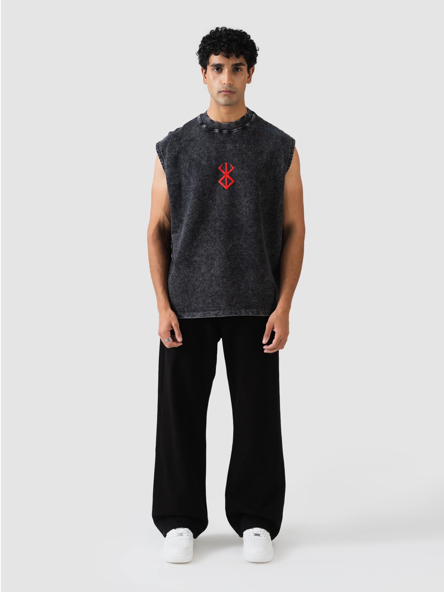 GROOVY black acid-wash sleeveless sando, tribal wing graphic, Pakistan
