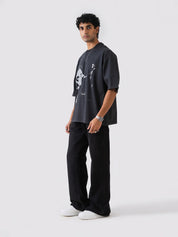 black oversized t-shirt by GROOVY Pakistan, photographic graphic print