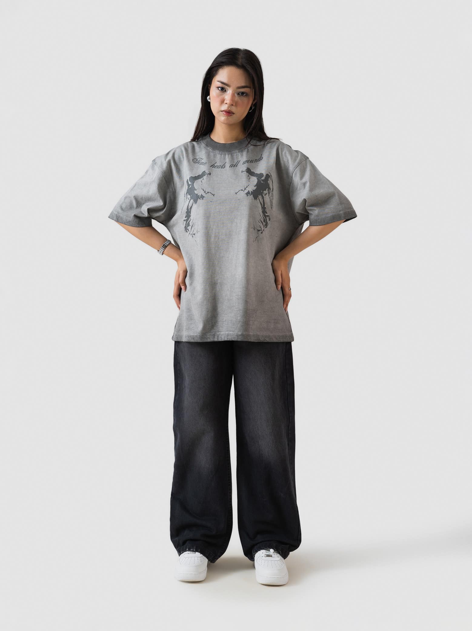 washed grey oversized t-shirt by GROOVY Pakistan, graphic print