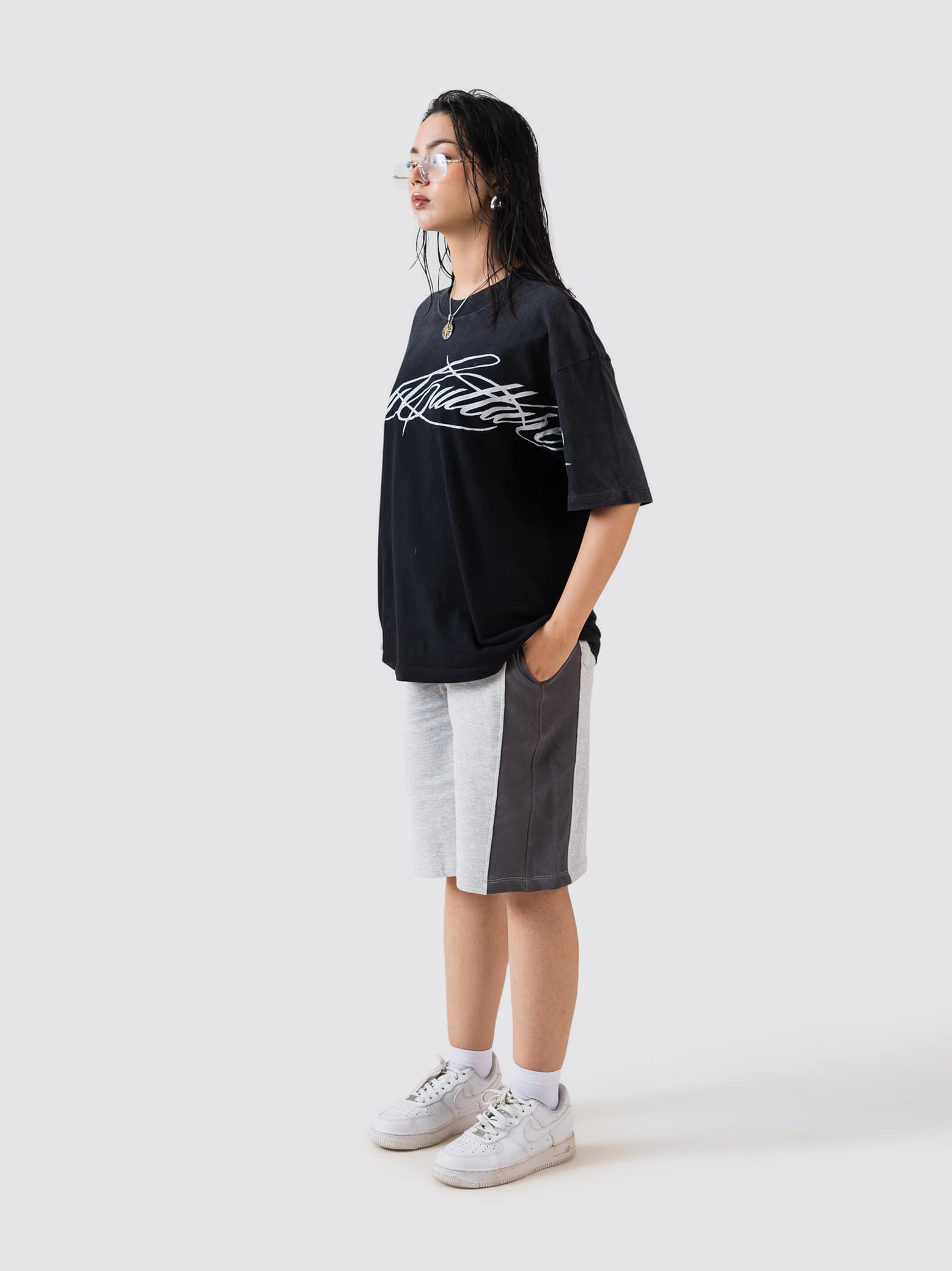 GROOVY Pakistan t-shirt, fade-washed black, script graphic print