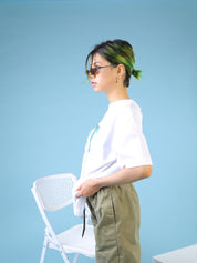 White Graphic Tee Couple Lifestyle Shot – Chill Out – GROOVY Pakistan